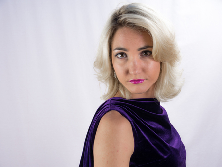 studio Photo of beautiful woman in dress on white backgroundの写真素材