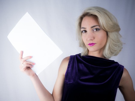 studio Photo of beautiful woman in dress on white backgroundの写真素材