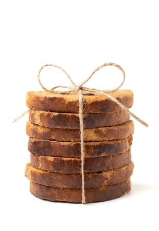Sweet rusks with raisins sprinkled with sugar on a white background. Isolated image, a concept for your design.の写真素材