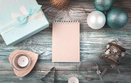 Happy New year and merry Christmas, festive layout with Notepad, gift box, Christmas balls and...
