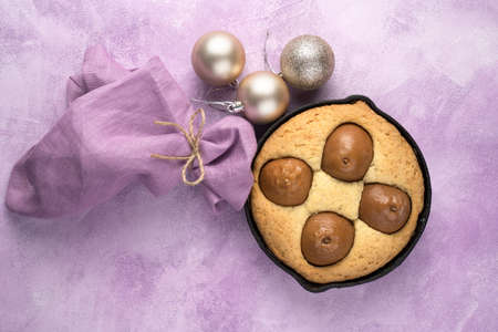 Pastries and ornament balls on  pink