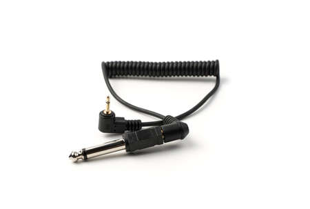 The sync cable with the connector and plug is isolated on a white background. Concept of accessories...
