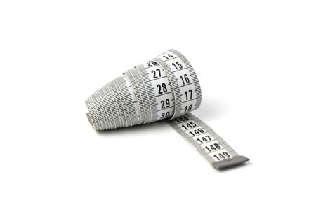 The flexible centimeter is isolated on a white background. Side view.