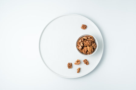 Peeled walnuts on a white background. The view from the top. The concept of healthy eating.の写真素材