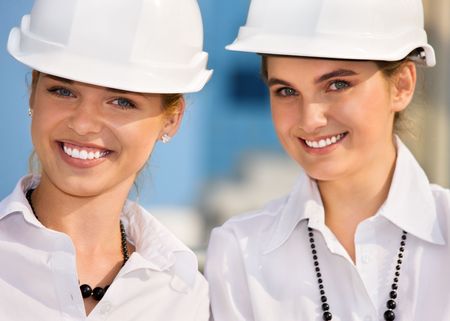 contractors in a front of building siteの写真素材