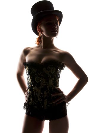 silhouette backlight picture of sexy woman in corsetの写真素材