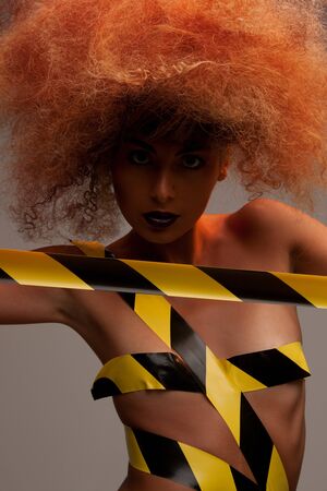 picture of woman with fashionable hair over greyの写真素材