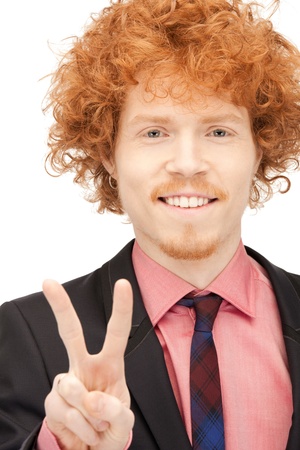 bright picture of handsome man showing victory signの写真素材