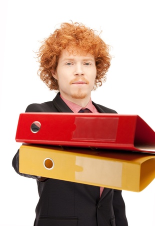 bright picture of handsome man with foldersの写真素材