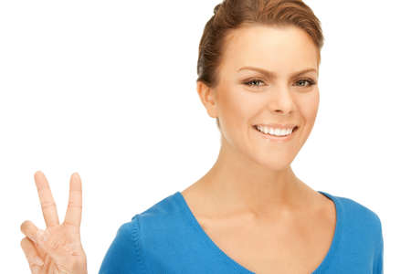 bright picture of lovely teenage girl showing victory sign