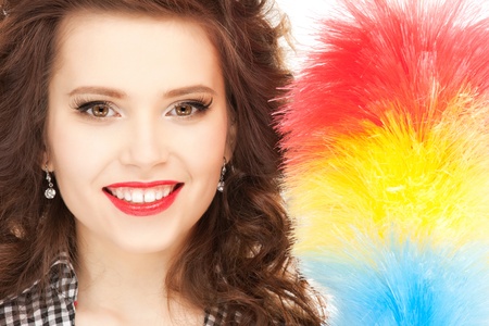 picture of beautiful woman with cleaning sweepの写真素材