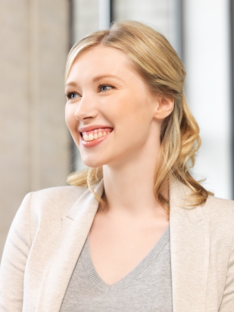 bright picture of happy and smiling womanの写真素材