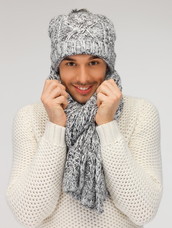 picture of handsome man in warm sweater, hat and scarf の写真素材