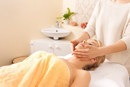picture of calm beautiful woman in massage salonの写真素材