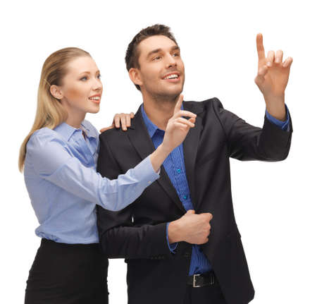 picture of man and woman working with something imaginary の写真素材