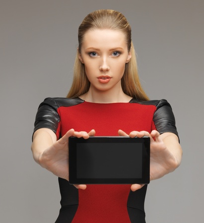 bright picture of futuristic woman with tablet pcの写真素材