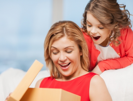 picture of mother and daughter with boxの写真素材