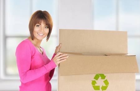 picture of attractive businesswoman with recyclable boxの写真素材
