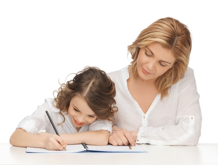 picture of mother and daughter doing home work picture of mother and daughter doing home work