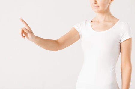 picture of young woman showing finger upの写真素材