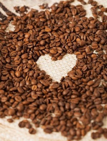 close up of coffee beans on the textile backgroundの写真素材