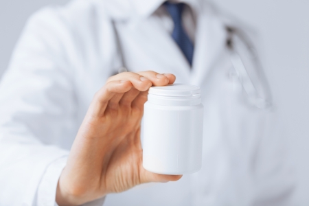 picture of doctor hands holding white packの写真素材