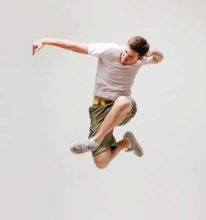 picture of male dancer jumping in the airの写真素材