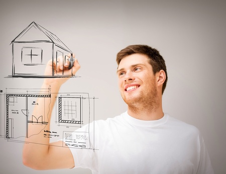 real estate, technology and accomodation concept - man drawing house and blueprint on virtual screenの写真素材