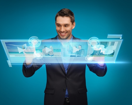 business, technology, internet and networking concept - businessman pressing buttons on virtual...
