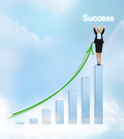 business, success and graphs concept - businesswoman with big 3d chartの写真素材