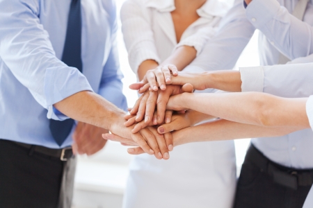 success and winning concept - happy business team celebrating victory in officeの写真素材