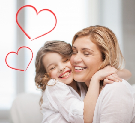 family, children and love concept - hugging mother and daughter