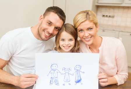 family, children and happy people concept - happy family drawing at homeの写真素材