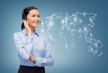 business and office concept - friendly female helpline operator with headphones