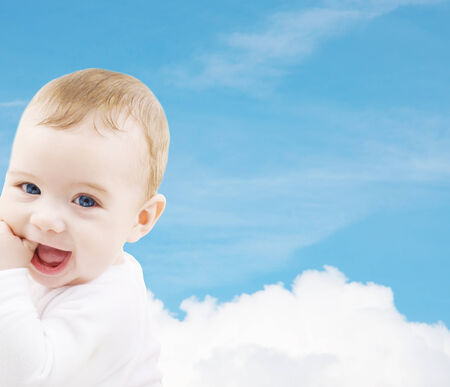 child, people and happiness concept - adorable baby boyの写真素材