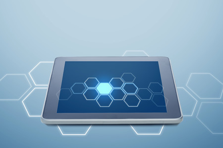 electronics, technology, network and modern gadget concept - tablet pc computer with cell pattern on screen over blue backgroundの写真素材