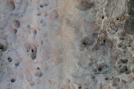 background, design and texture concept - relief volcanic stone texture