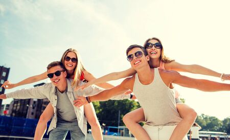 smiling couple having fun in cityの写真素材