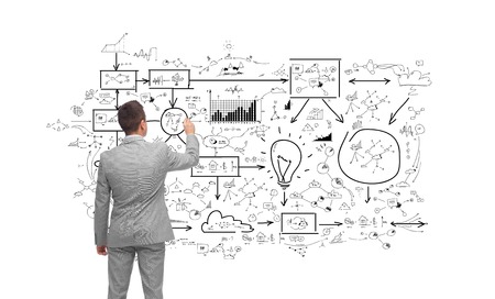 business, people, planning and strategy concept - businessman writing or drawing business schemeの写真素材