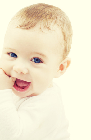 child, people and happiness concept - adorable baby boyの写真素材