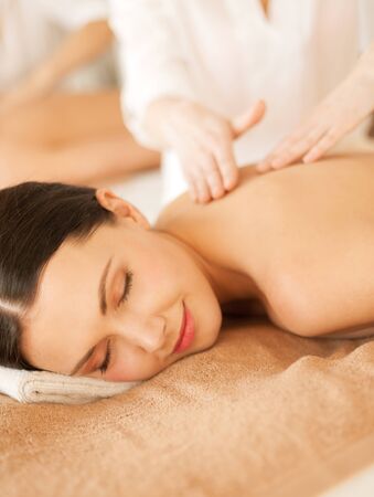 picture of woman in spa salon getting massageの写真素材