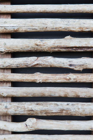 backgrounds and texture concept - fence or shutters of wooden sticksの写真素材
