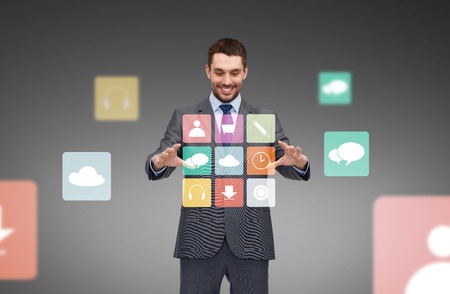 business, technology and people concept - smiling businessman working with menu icons projection