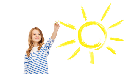 education, school and happy people concept - cute little girl drawing big sun in the airの写真素材