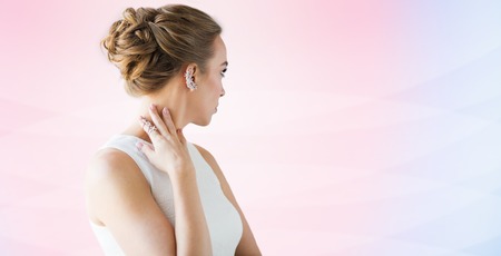 glamour, beauty, jewelry and luxury concept - close up of beautiful woman with golden ring and...