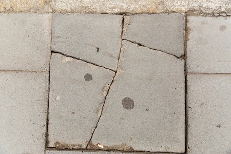 masonry and stonework concept - close up of cracked stone plateの写真素材