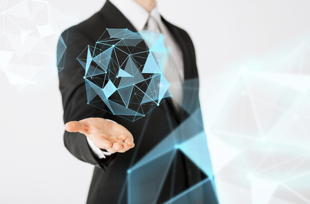 people and business concept - close up of businessman showing virtual polygonal matrix l projectionの写真素材