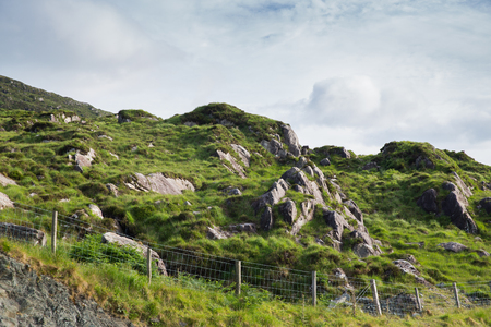 nature and landscape concept - view to rocky hills in irelandの写真素材