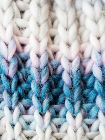 handicraft, knitwear and needlework concept - close up of knitted itemの写真素材
