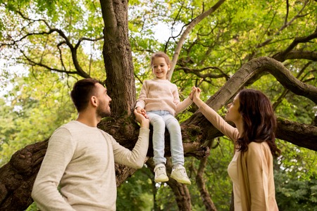 happy family in summer park having funの写真素材